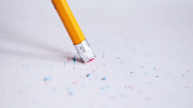 a worn out yellow pencil in close up